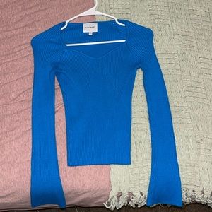 bright blue long sleeve top